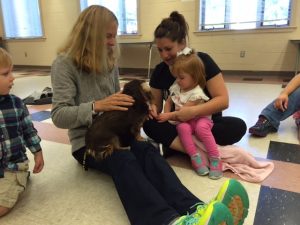 pet-therapy-skaneateles-dachshund-gemma-meets-little-girl