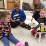 pet-therapy-skaneateles-parsons-dachund-sitting-with-friends