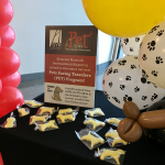 airport_pet_therapy_signage_balloons_cookies
