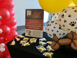 airport_pet_therapy_signage_balloons_cookies